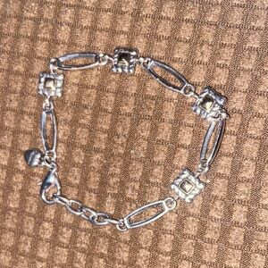 Elegant Silver Bracelet with Gold Accents